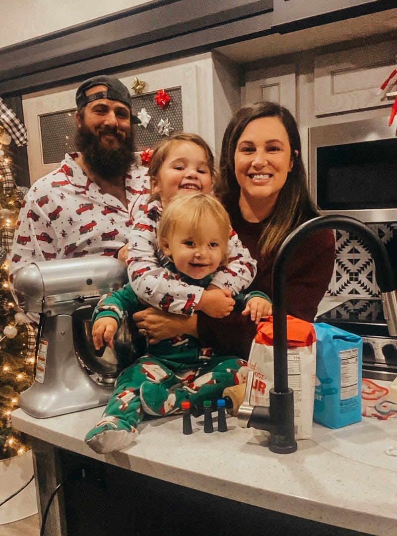 Sammy Seles' family smile for a photo inside of the kitchen of their Keystone Montana.
