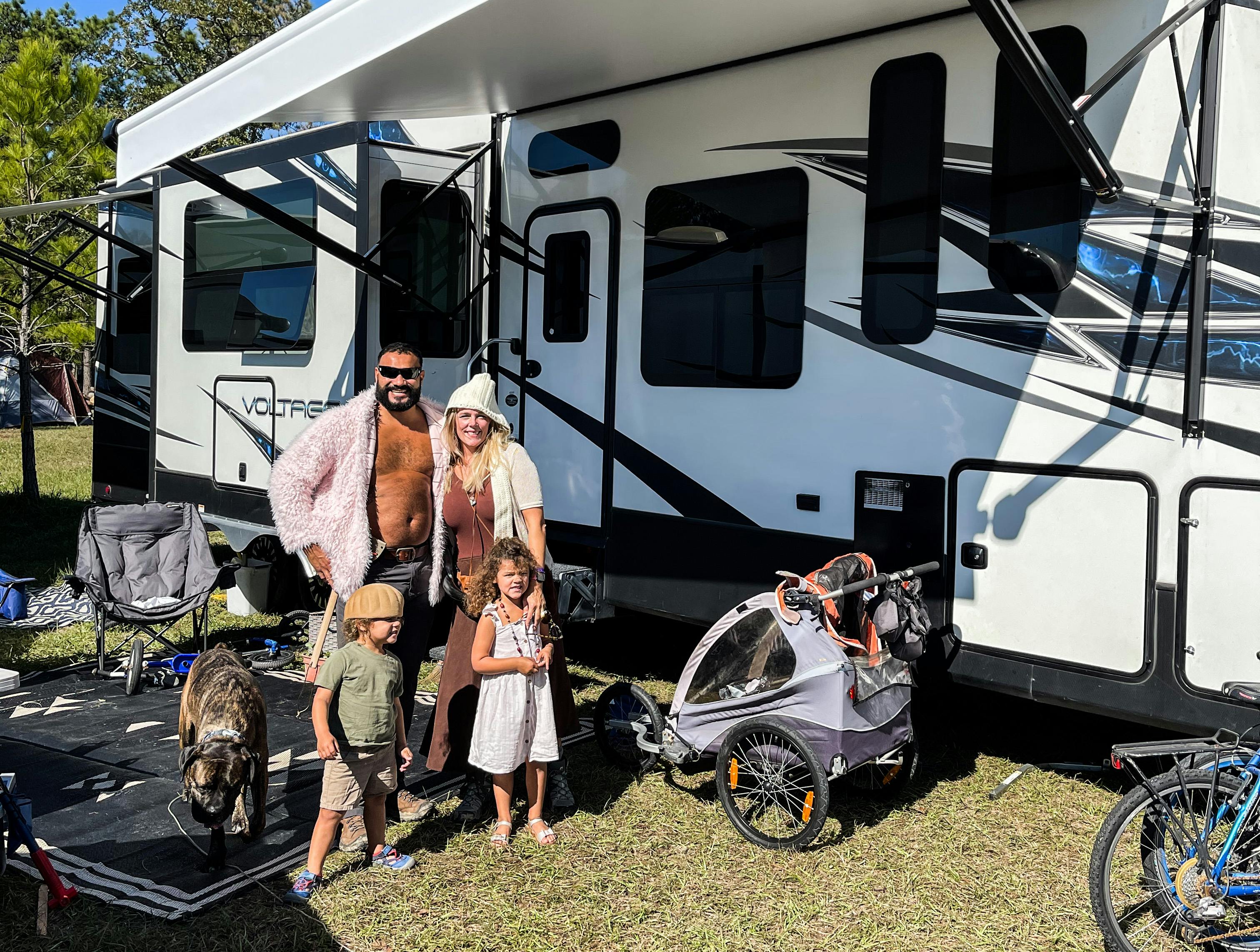 Samantha Edmunds and her family in front of their RV at the Texas Renaissance Festival

