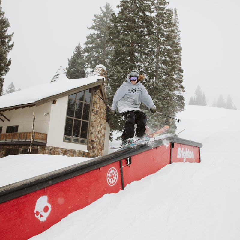 Ryan skiing down a rail.