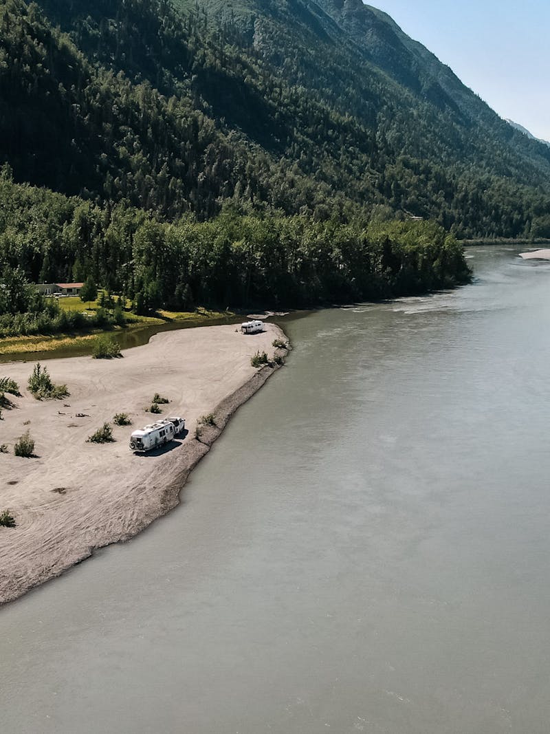 An aerial view of Karen Blue's RV parked alongside a lake