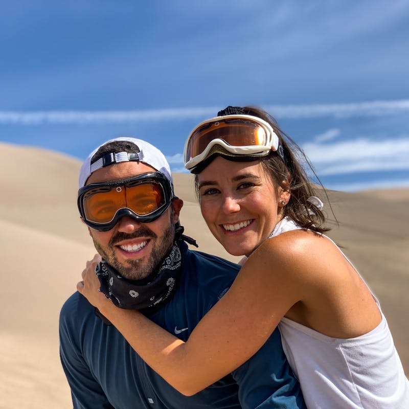 Dawn hugs Jason as they post for a picture in Great Sand Dunes National Park.