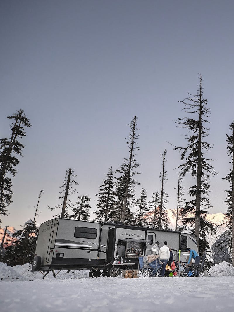 Two RVs parked in the snow