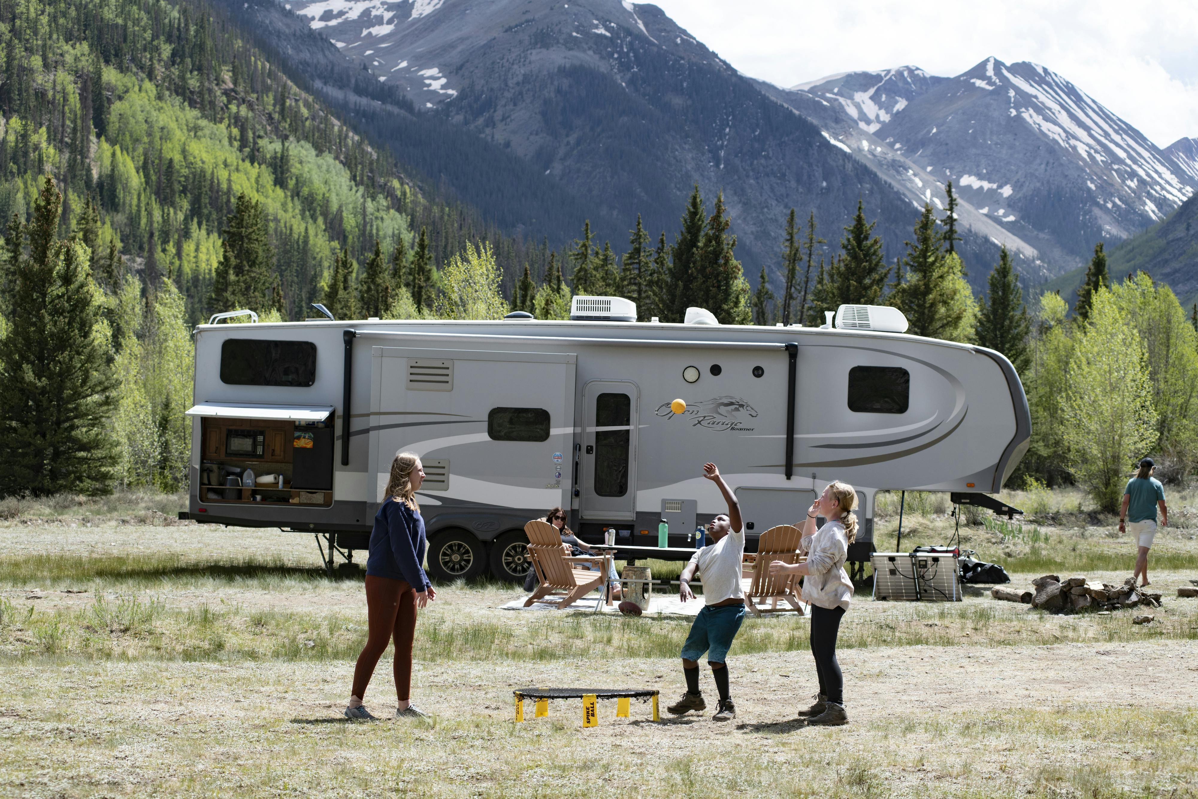 the Carew children playing a game in front of their RV