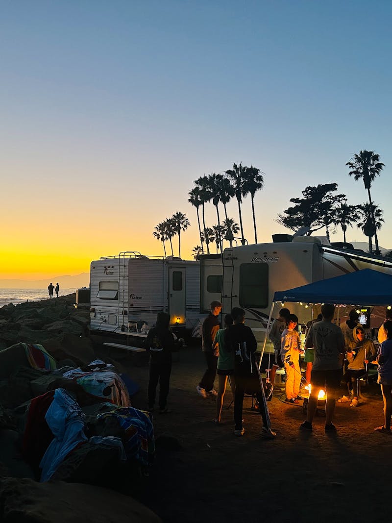 The Brenda Huynh and Tiger Doan family with friends camping at the beach with their Thor Motor Coach Vegas Class A motorhome