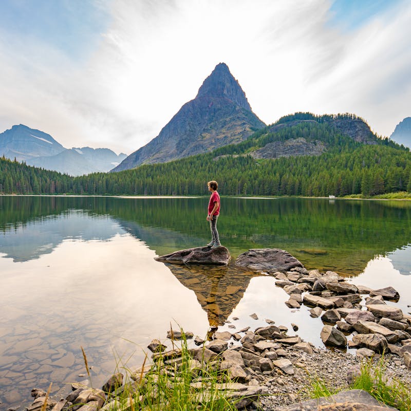 Renee Tilby's son at swift current lake at Glacier National Park