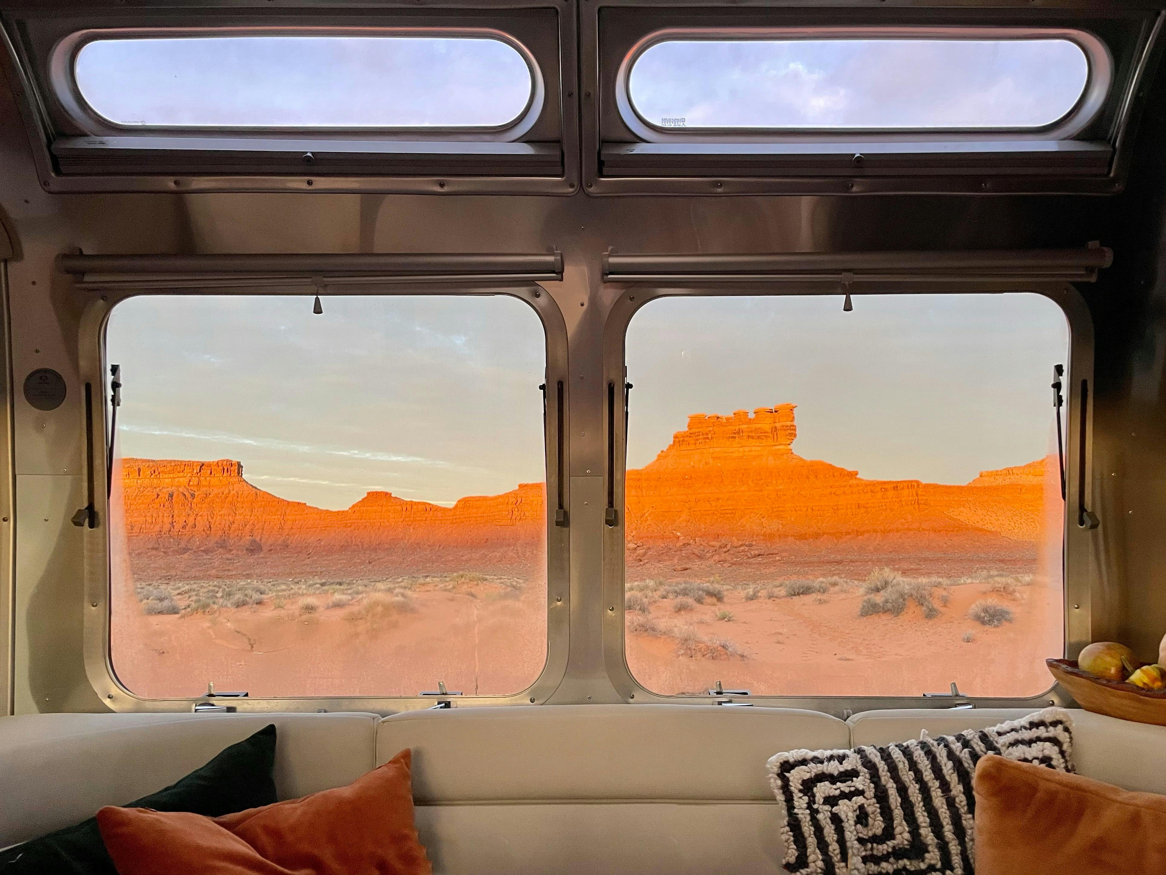 The view of the desert through Karen Blue's Airstream windows