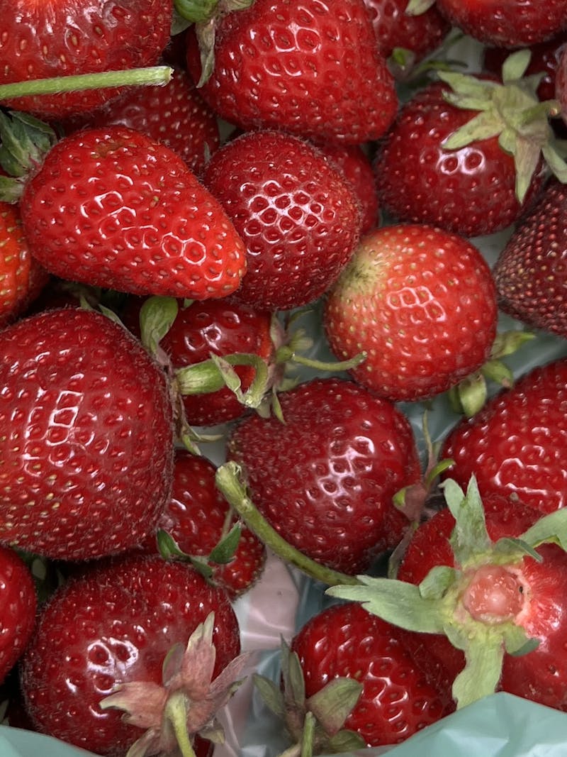 A bag of fresh strawberries 