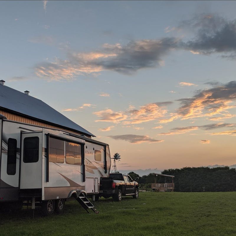 Mike and Brittany Ciepluch's Keystone Montana fifth parked at dusk.