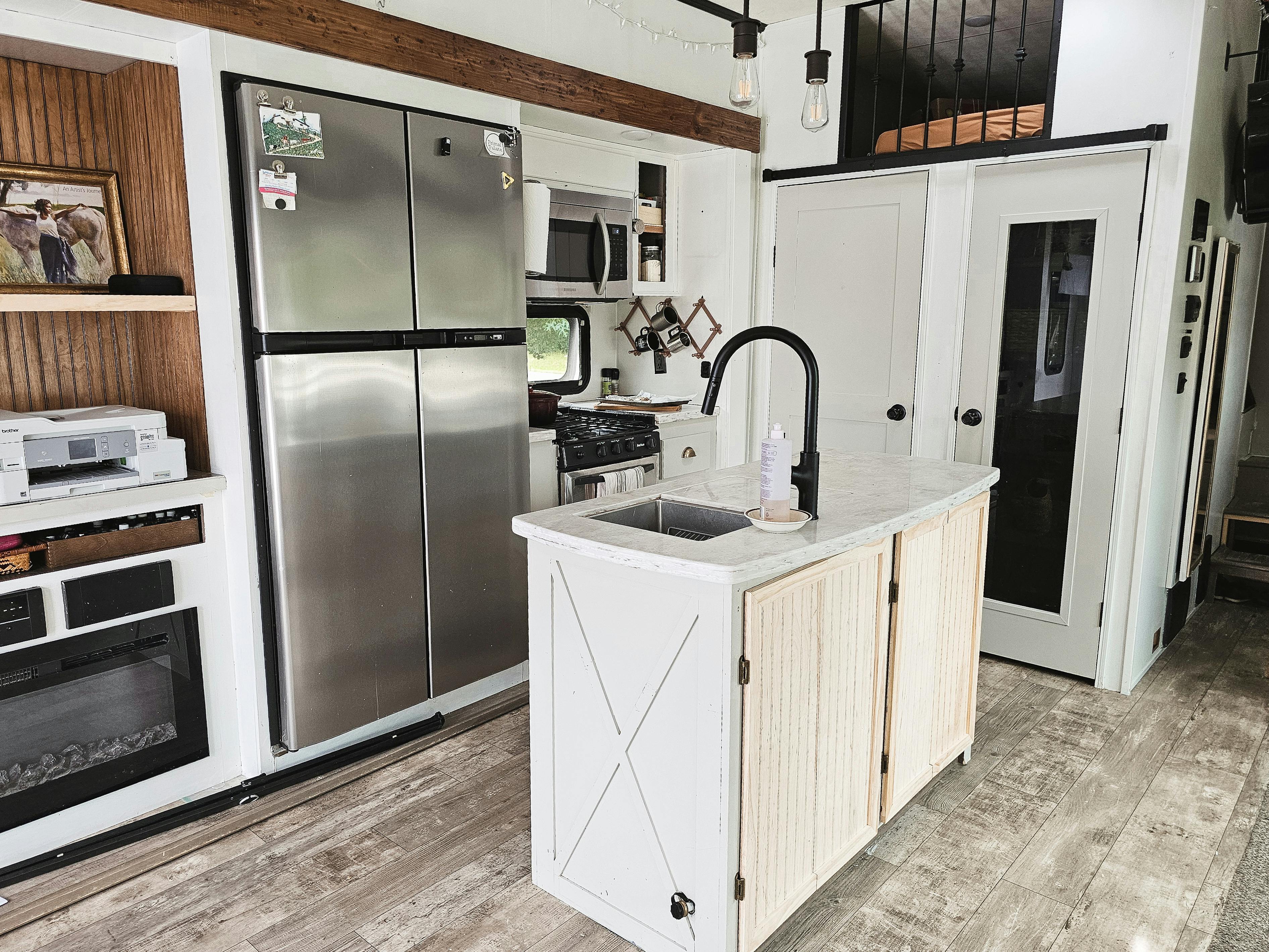 The spacious kitchen island inside Bibi Barringer's KZ Durango Gold fifth wheel.