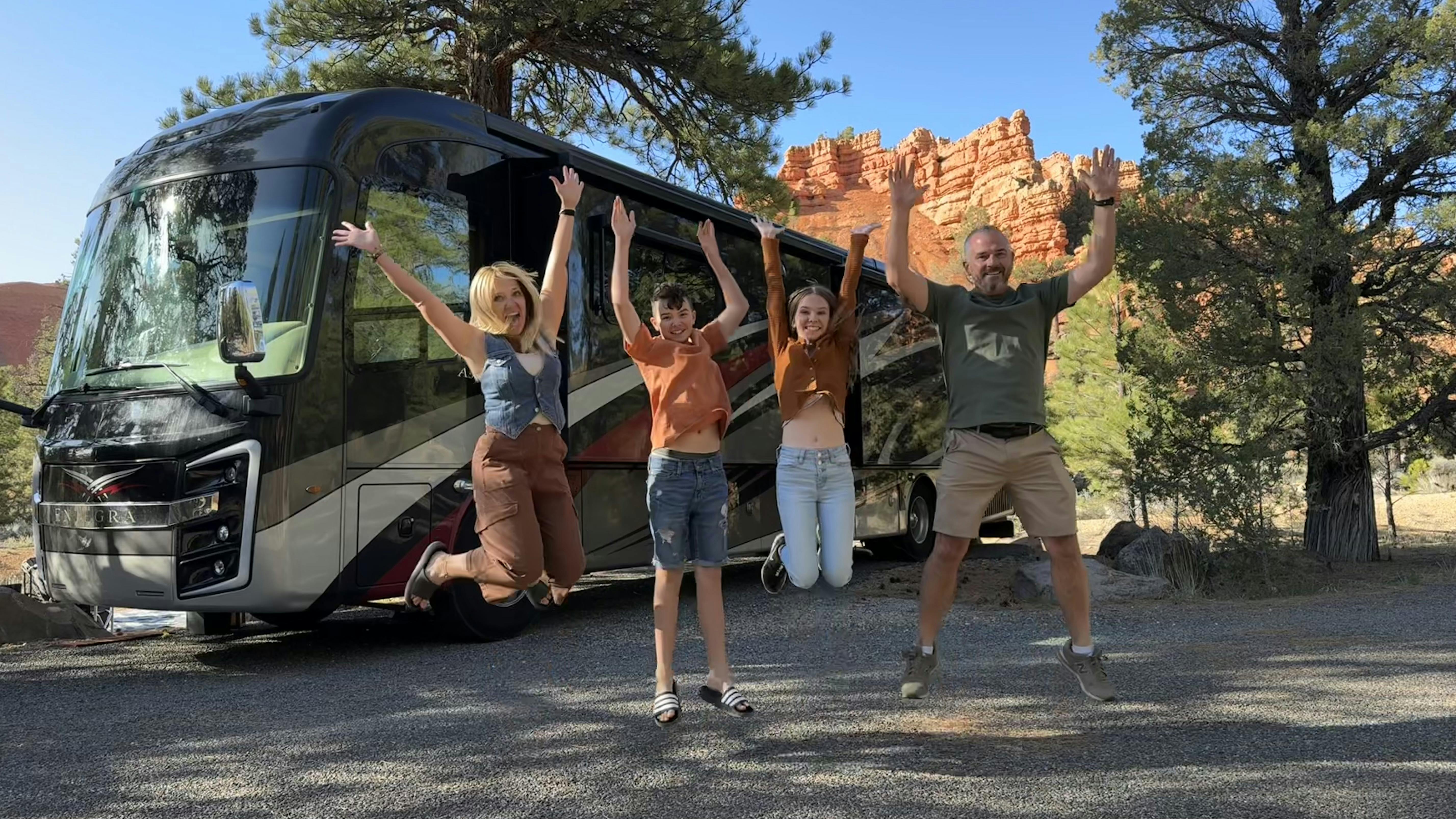 Carrie Cassity and her family in front of their Entegra Aspire Class A motorhome.