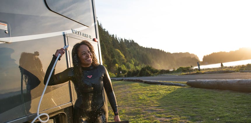 Layla Anane spraying her wet suit