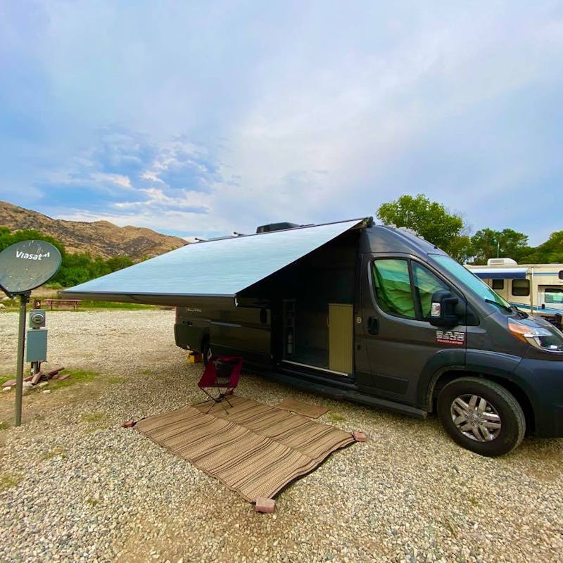 Jess Lawson's Thor Motor Coach Tellaro parked under a clear sky.