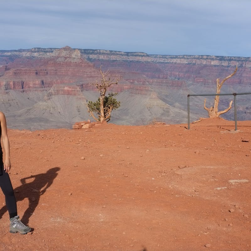 Dr. Na posing for a picture at the Grand Canyon.