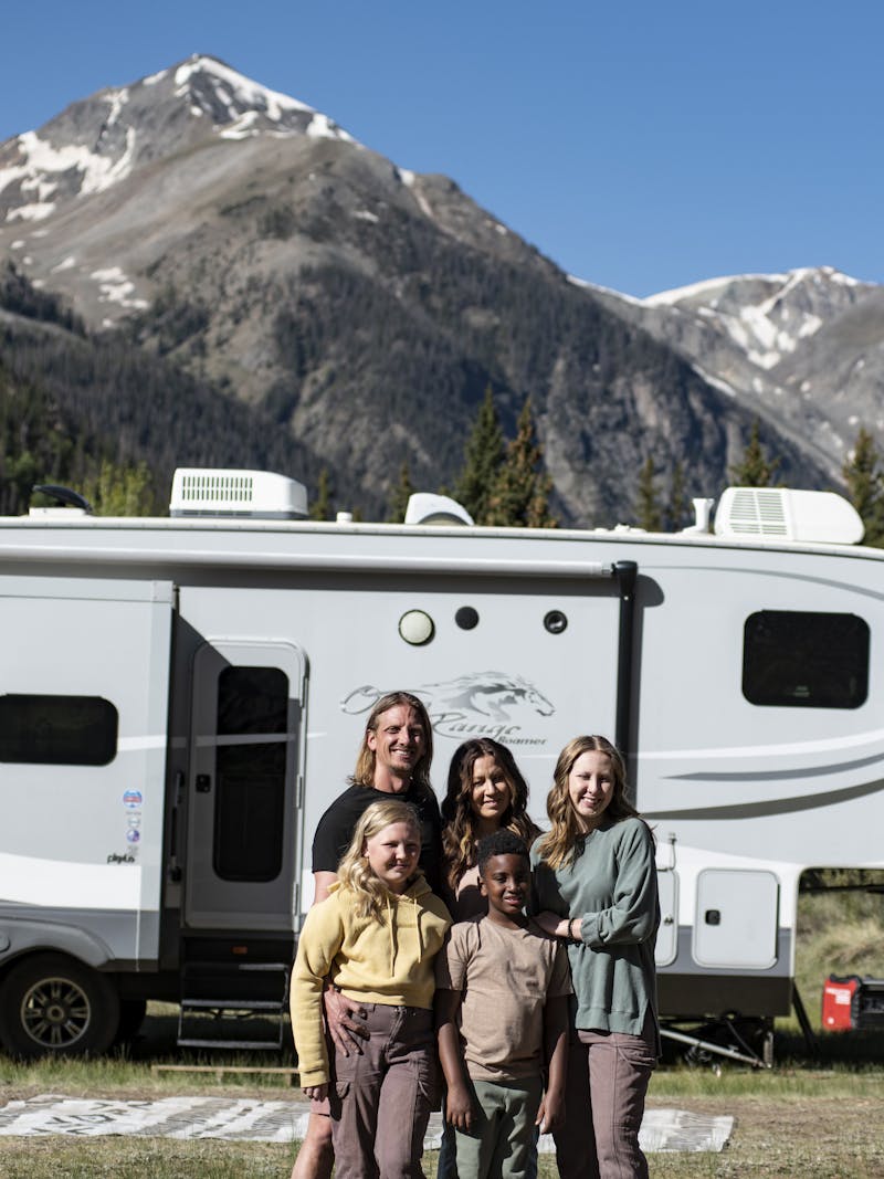 The Carew family portrait in front of their RV