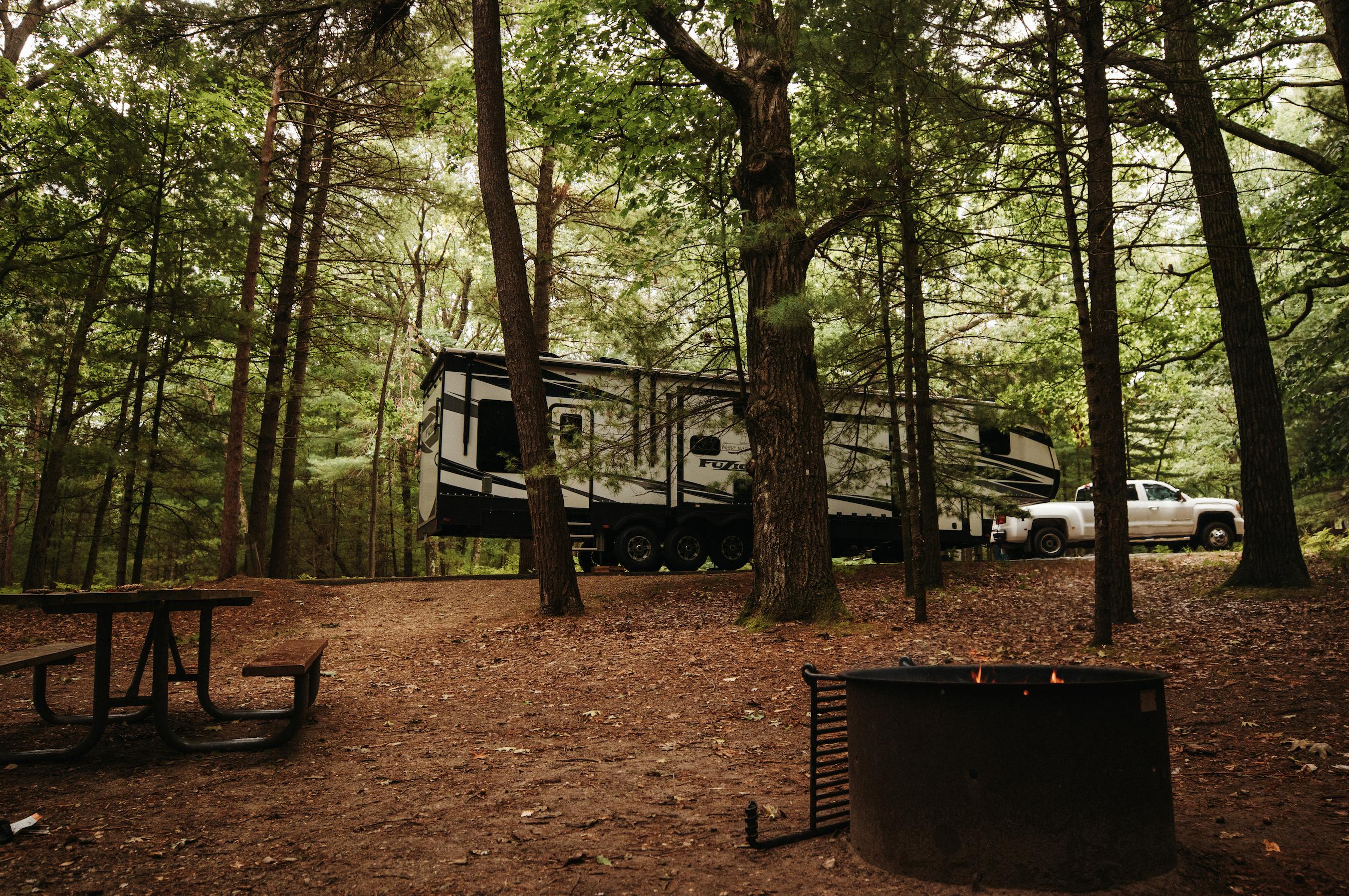 Andy and Kris Murphy's RV parked at a campsite at Huron-Manistee National Forest