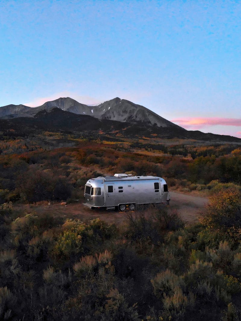 Stacey Power's Airstream parked in a boondocking camping spot overlooking the sunset