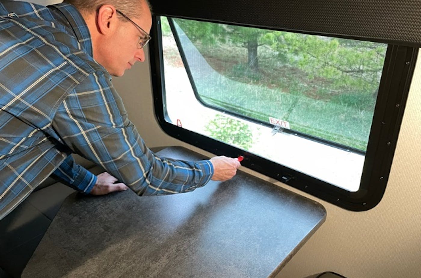 Matt Gleason checking the windows in his RV
