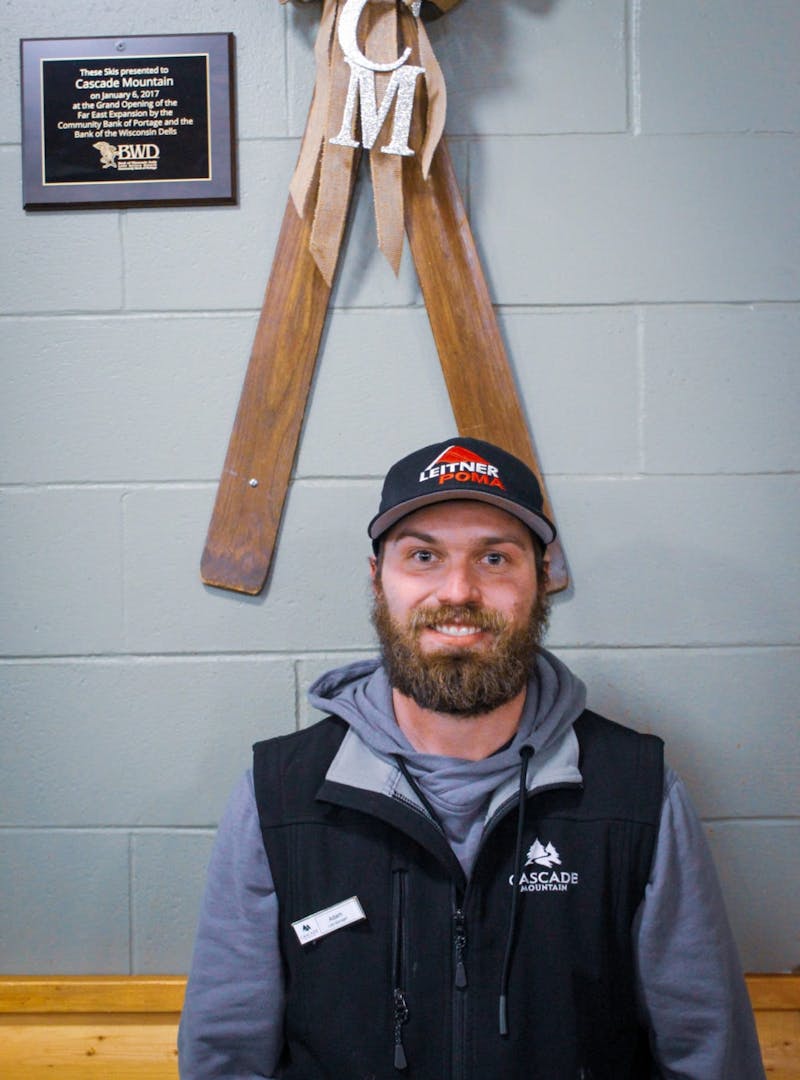 Adam Walz Cascade Mountain Ski resort cafe smiles for camera