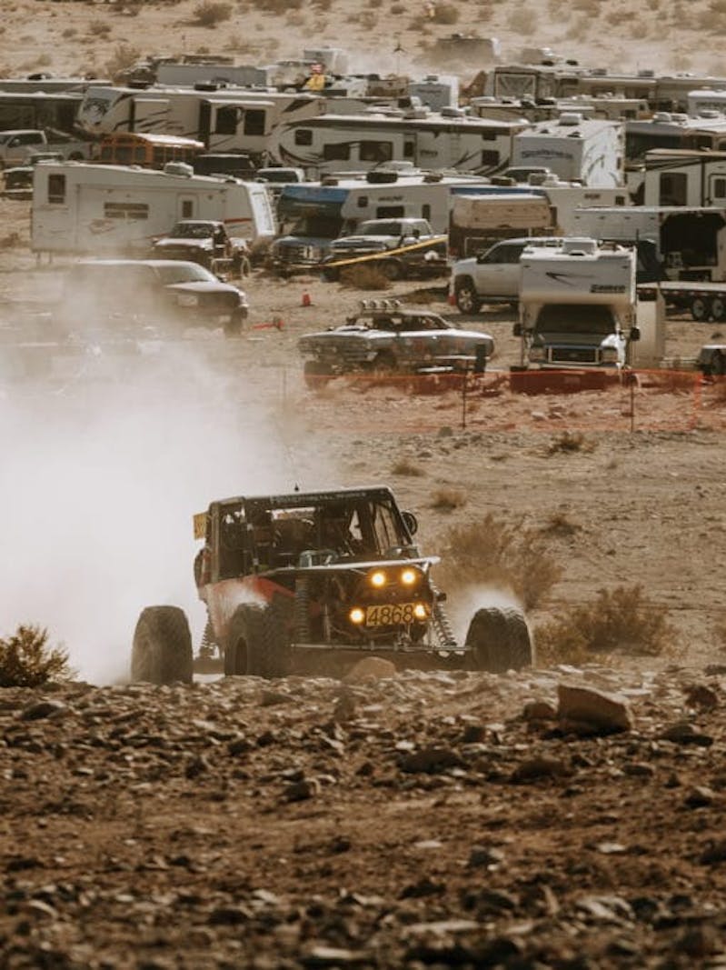 Ultra4 vehicle crawling through a rock section during the King of the Hammers race.