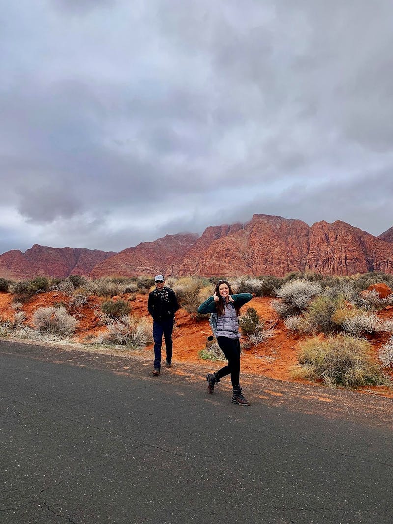 DUSTIN & SARAH BAUER on a hike in the desert
