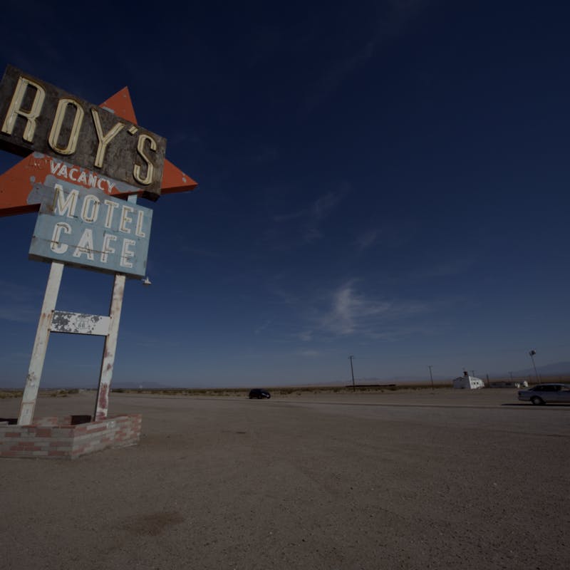 Blue sky with Roy's Motel Cafe sign in Amboy, California
