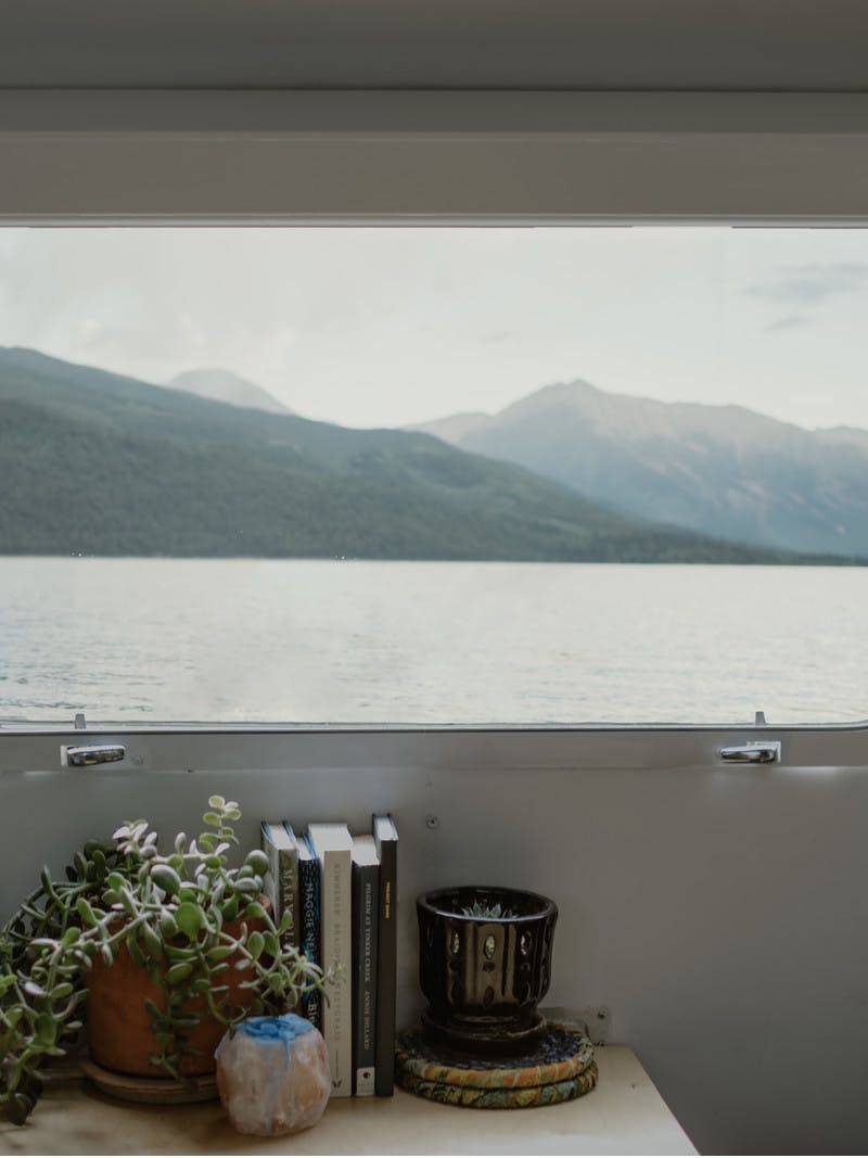 A view from the inside of an RV looking out the window to the Twin Lakes, in Colorado.