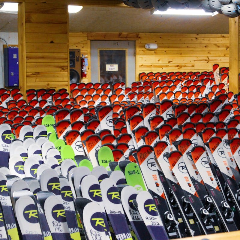 Rows and rows of skis at the Cascade Mountain rental shop