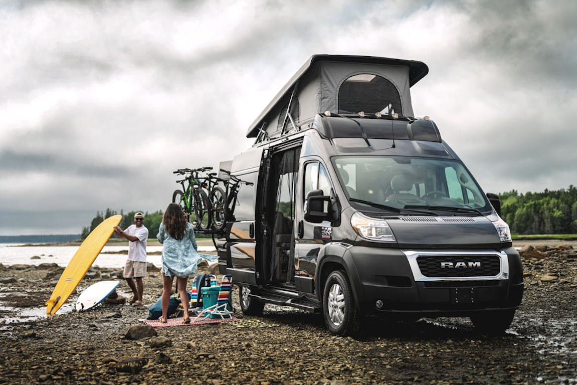 2022 Thor Scope Class B RV Camper Van Lifestyle Maine Corporate photo shoot parked at campsite SkyBunk® Sky Bunk Pop top extended