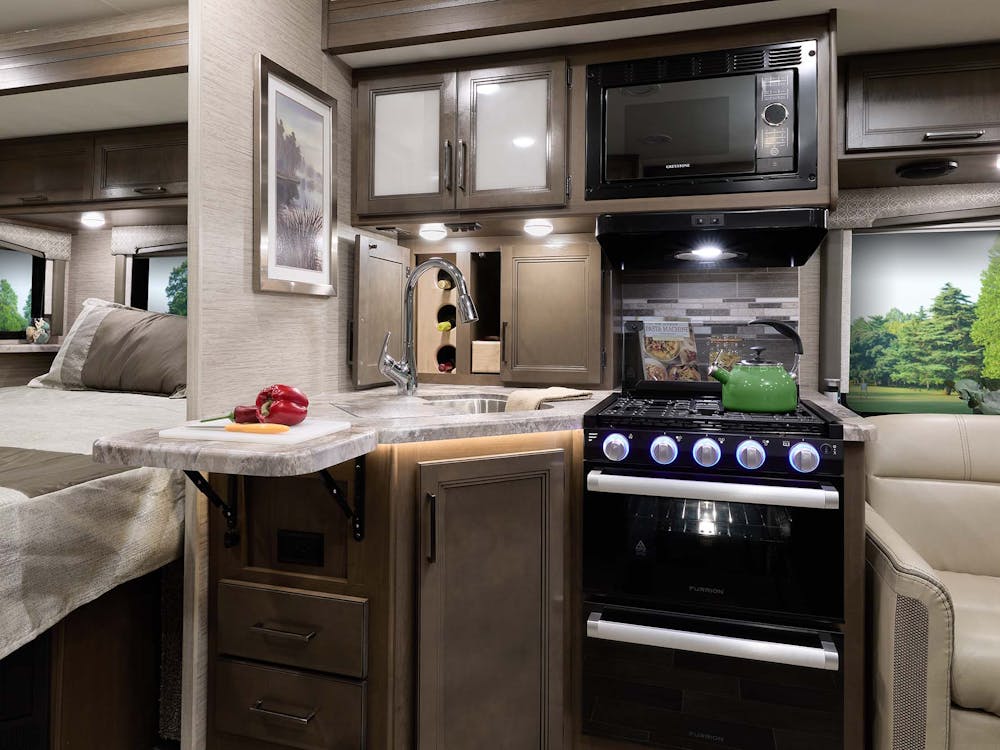 2022 Thor Chateau Class C RV 27R Kitchen - Ocean Pearl Carolina Cherry Cabinetry