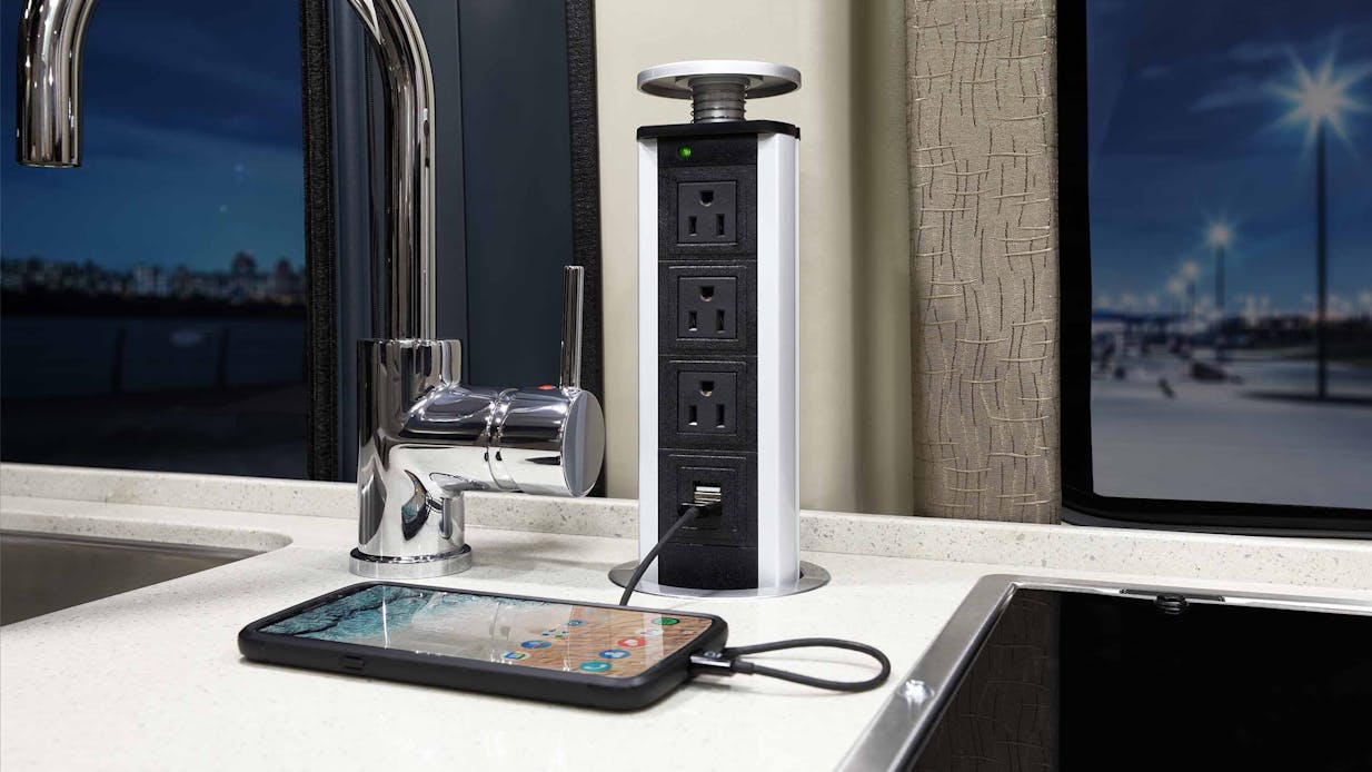 Pop up countertop outlet