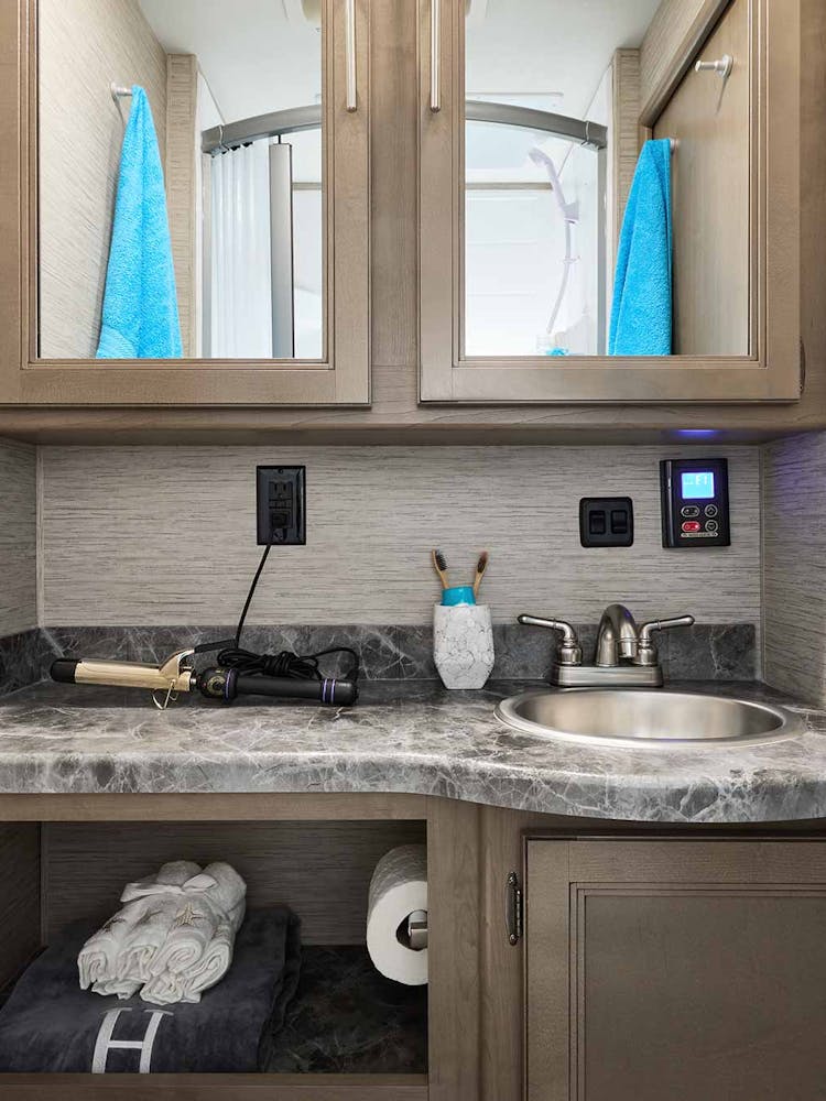 2022 Thor Outlaw Class C Toy Hauler RV 29J Bathroom - Street Blues Irish Maple Cabinetry