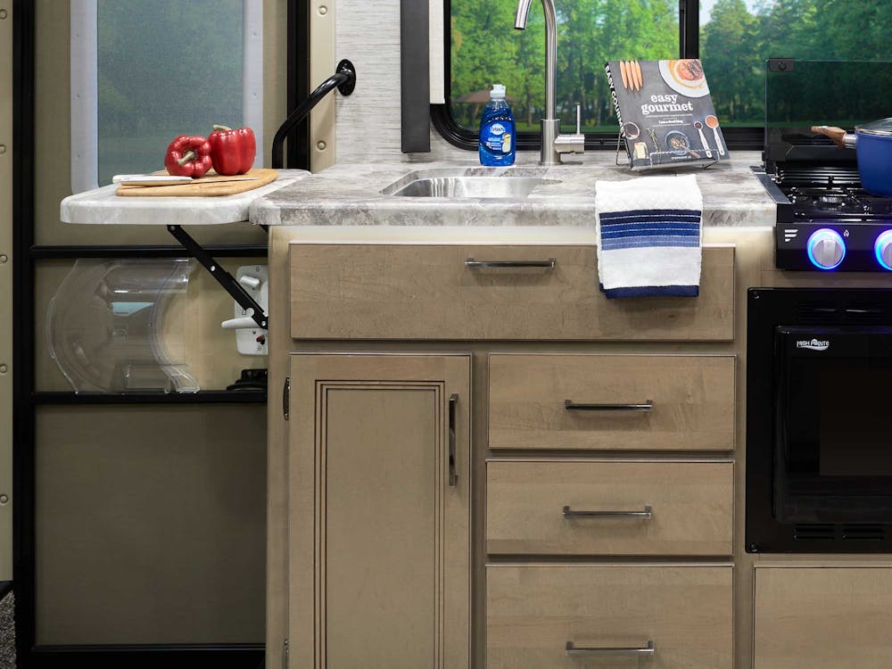 2021 Thor Four Winds Mercedes Sprinter RV 24BL Kitchen - Nautical Blue Irish Maple Cabinetry LED Accent Lighting Countertop key feature