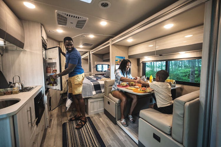 2022 Thor Gemini AWD Class B+ RV Lifestyle Maine Corporate Photo Shoot family eating at dinette