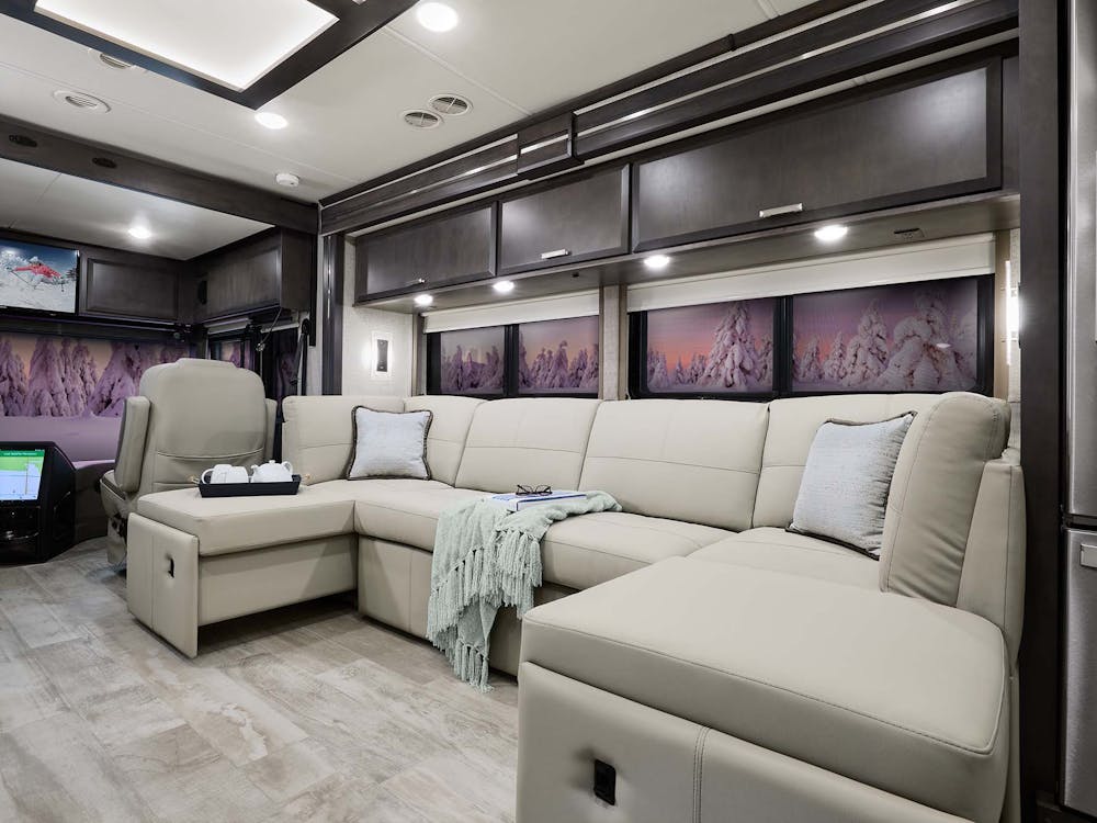 2022 Thor Tuscany Class A Diesel Pusher RV 45BX Chaise Hide-A-Bed Sofa - Studio Collection™ Portofino Regatta Cabinetry