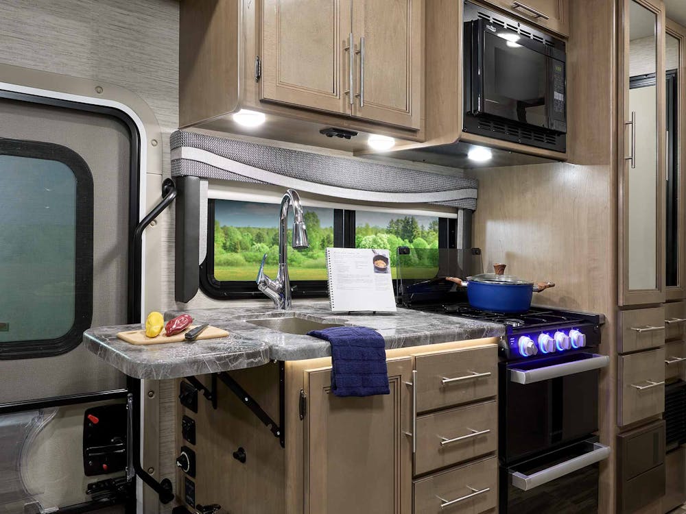 2022 Thor Outlaw Class C Toy Hauler RV 29J Kitchen - Street Blues Irish Maple Cabinetry