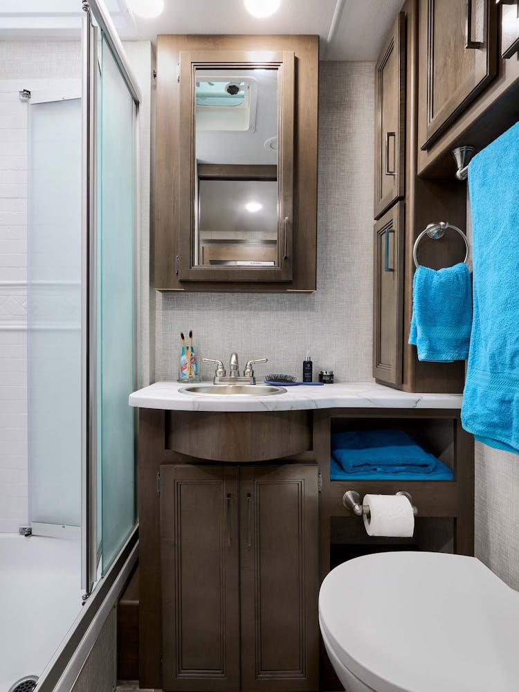 2022 Thor Hurricane Class A RV Bathroom - Silver Strand Carolina Cherry Cabinetry