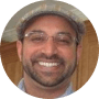 A headshot of Amit Gulati