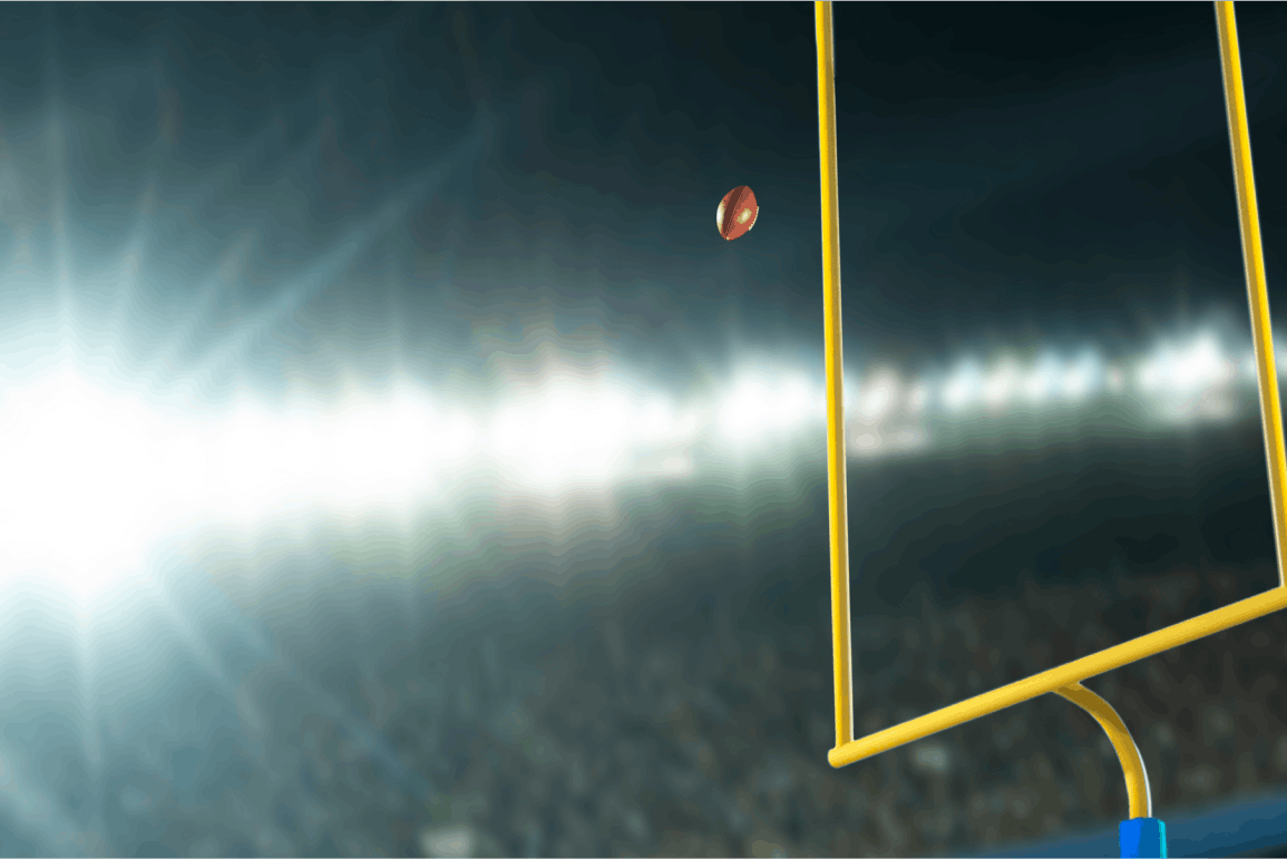 An image of successful kick-off through football goal post