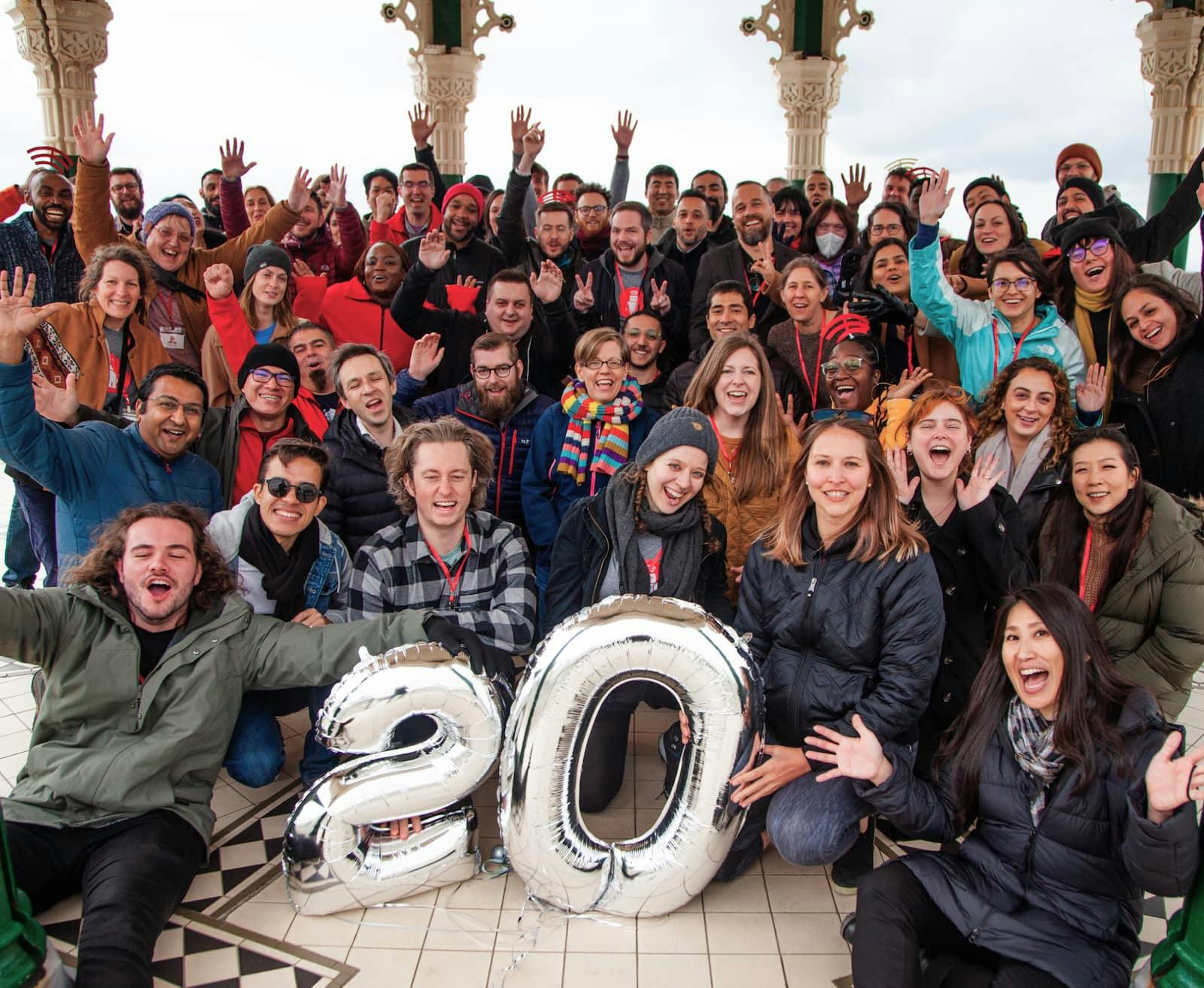 The thoughtbot team gathered together for a group photo to celebrate the companies 20th anniversary.