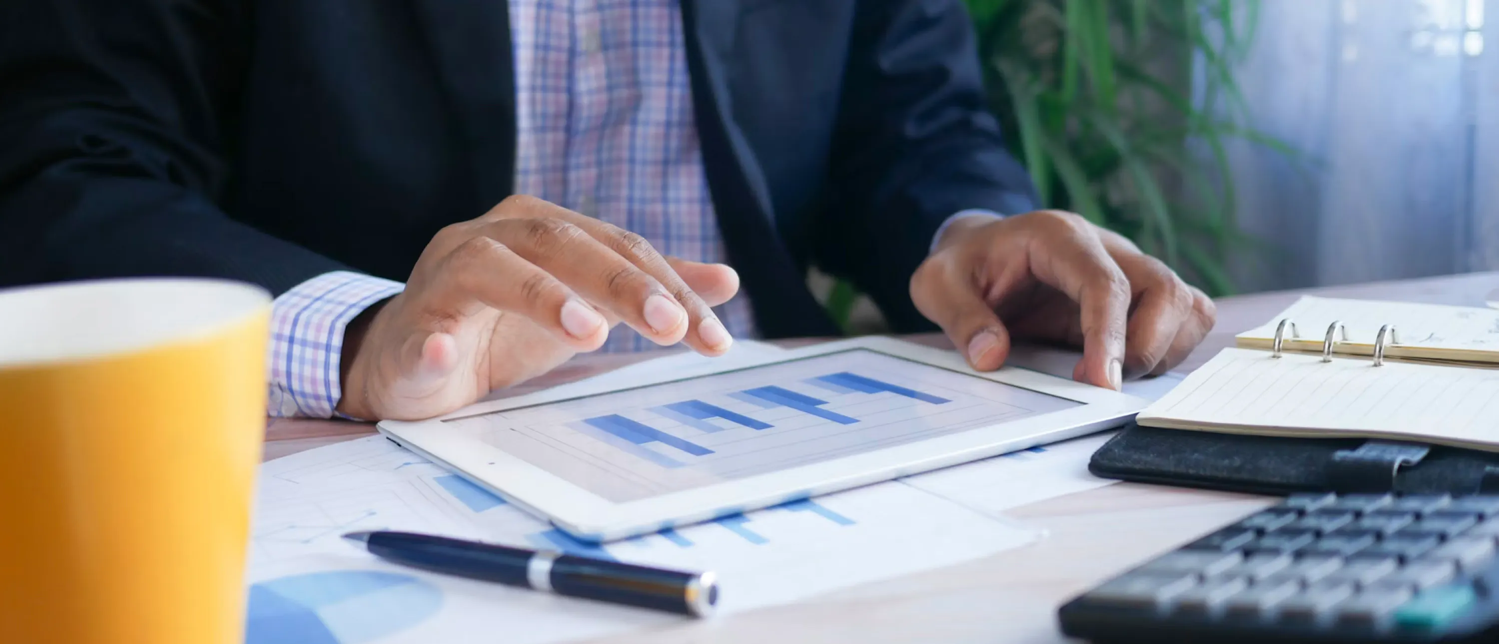 Image of individual at a desk financial planning