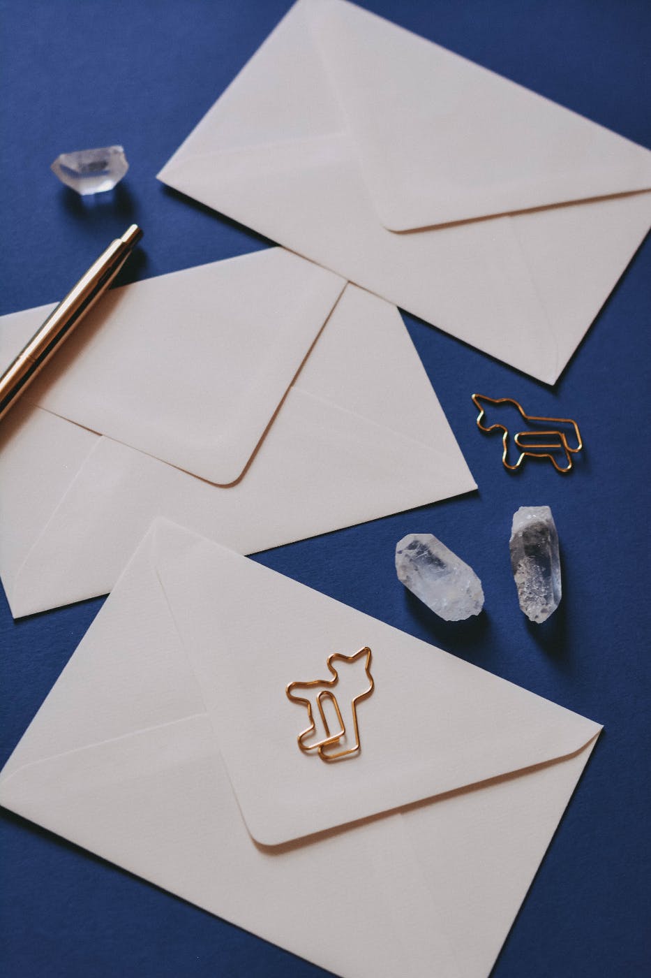 envelopes, paper and pen