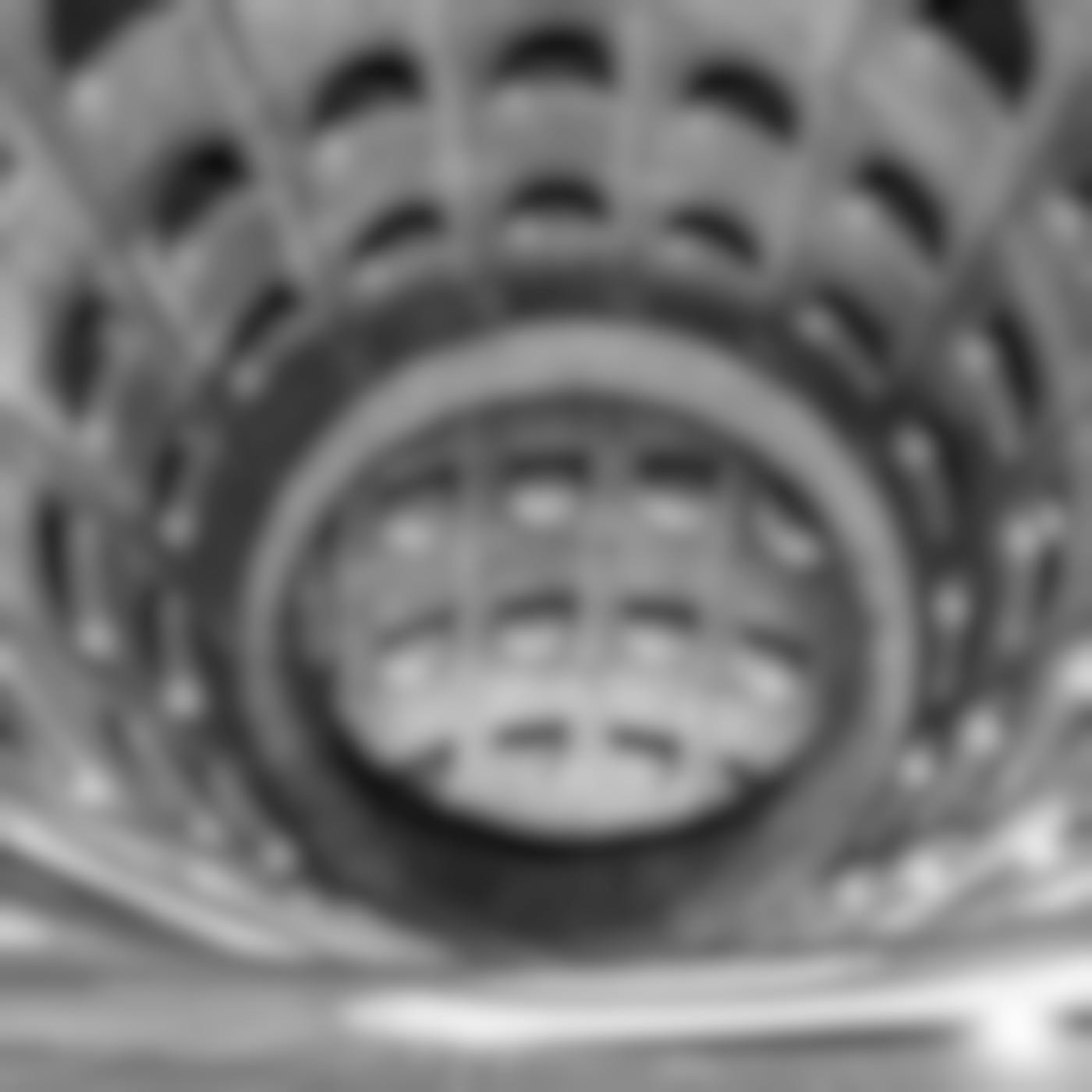 interior spiral building in black and white
