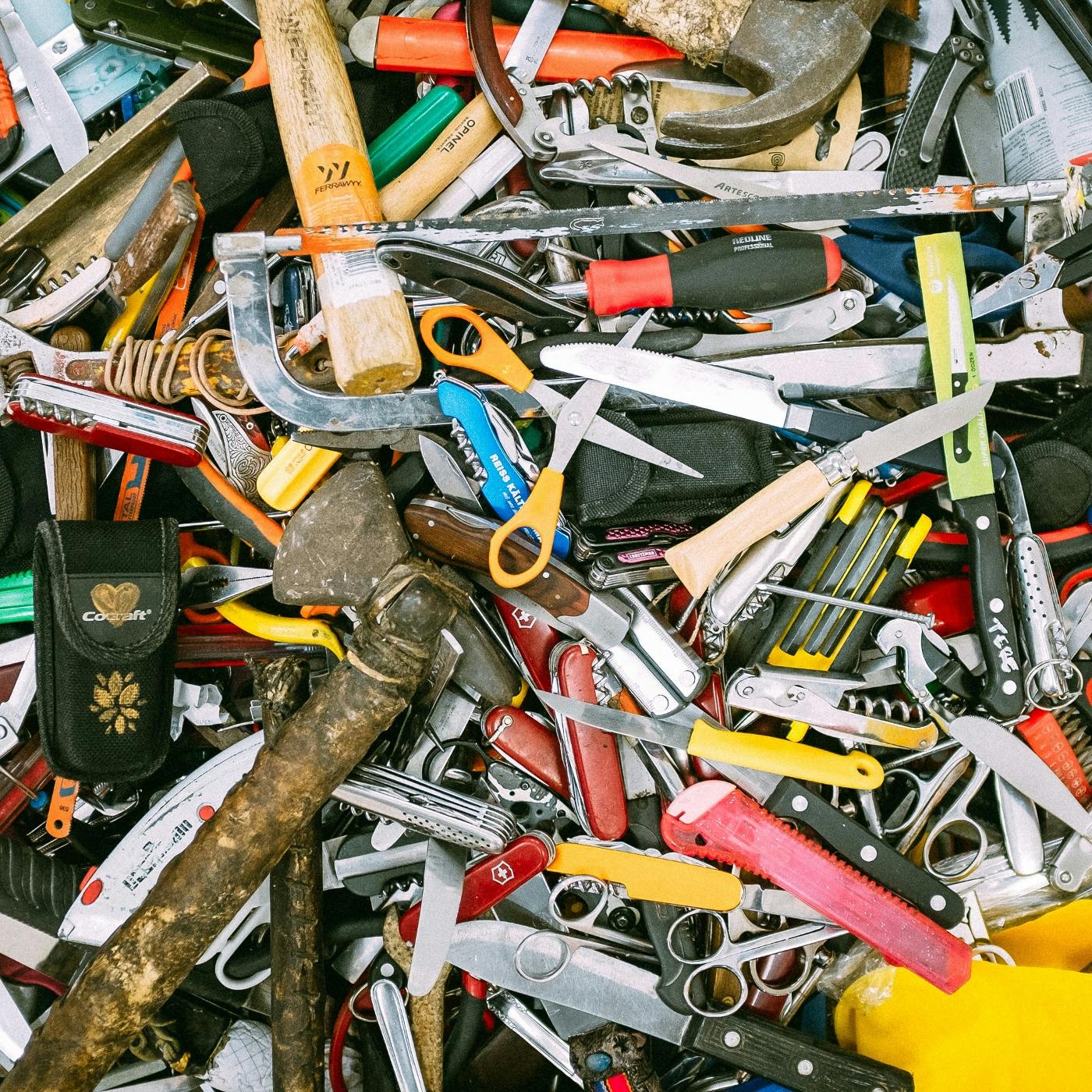 A pile of various, well-used tools