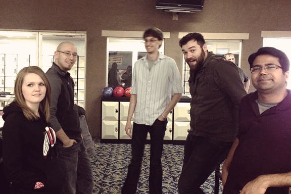 ThoughtLab employees at bowling alley