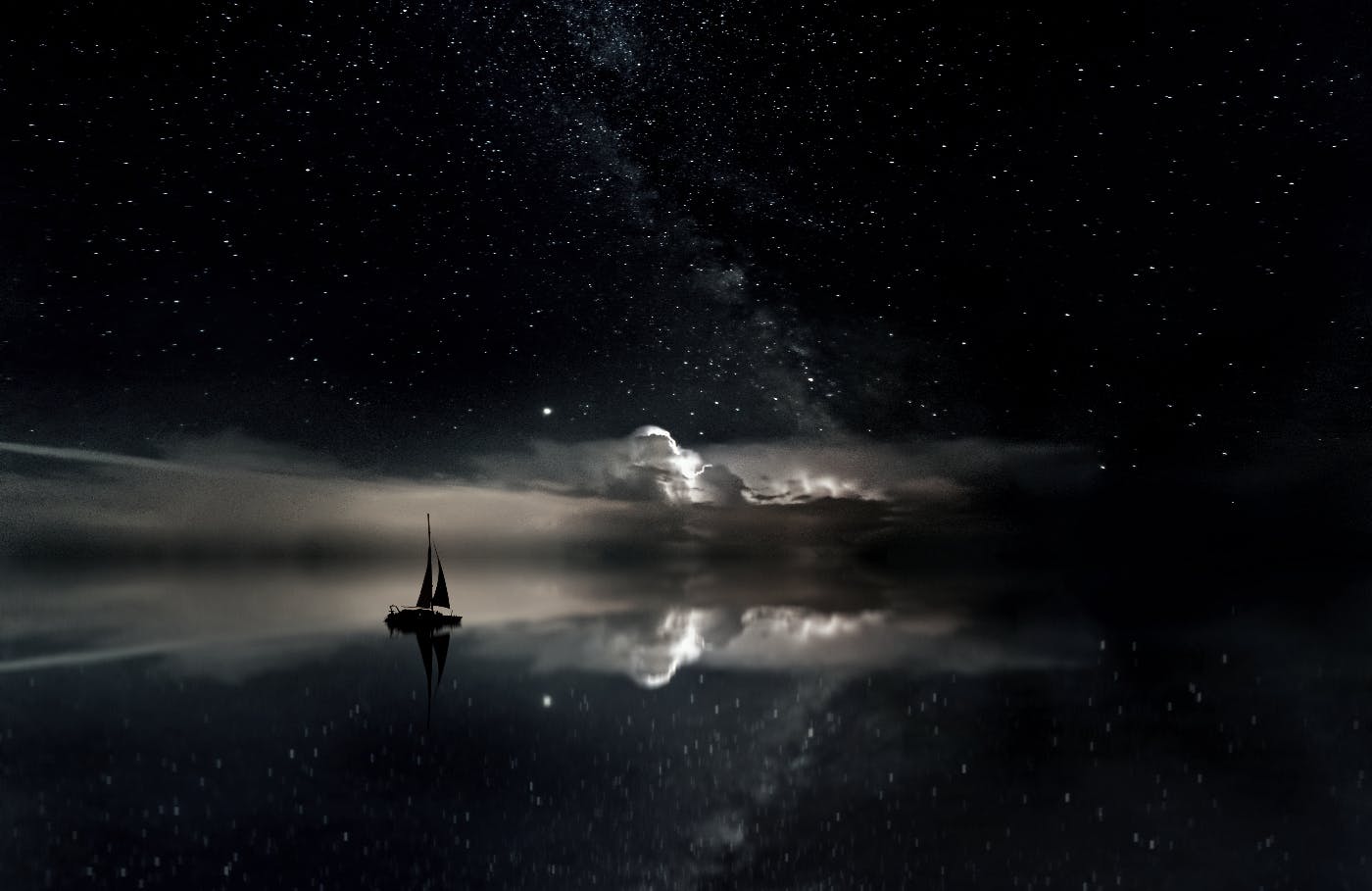 a dream of a ship in the starry night sailing into a cloud bank