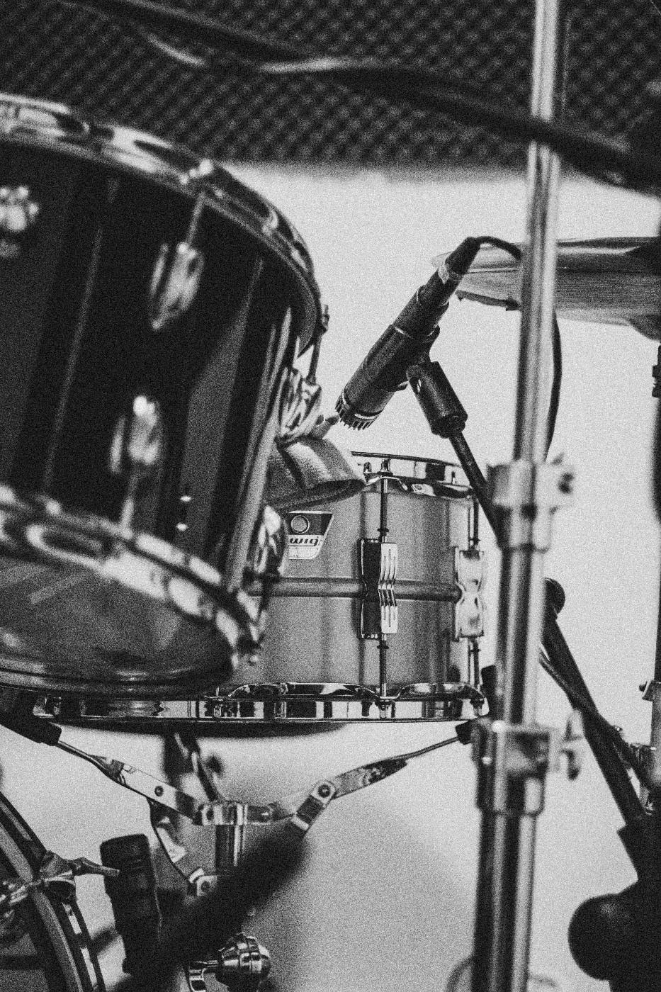 a close up of a drum kit, snare and tom