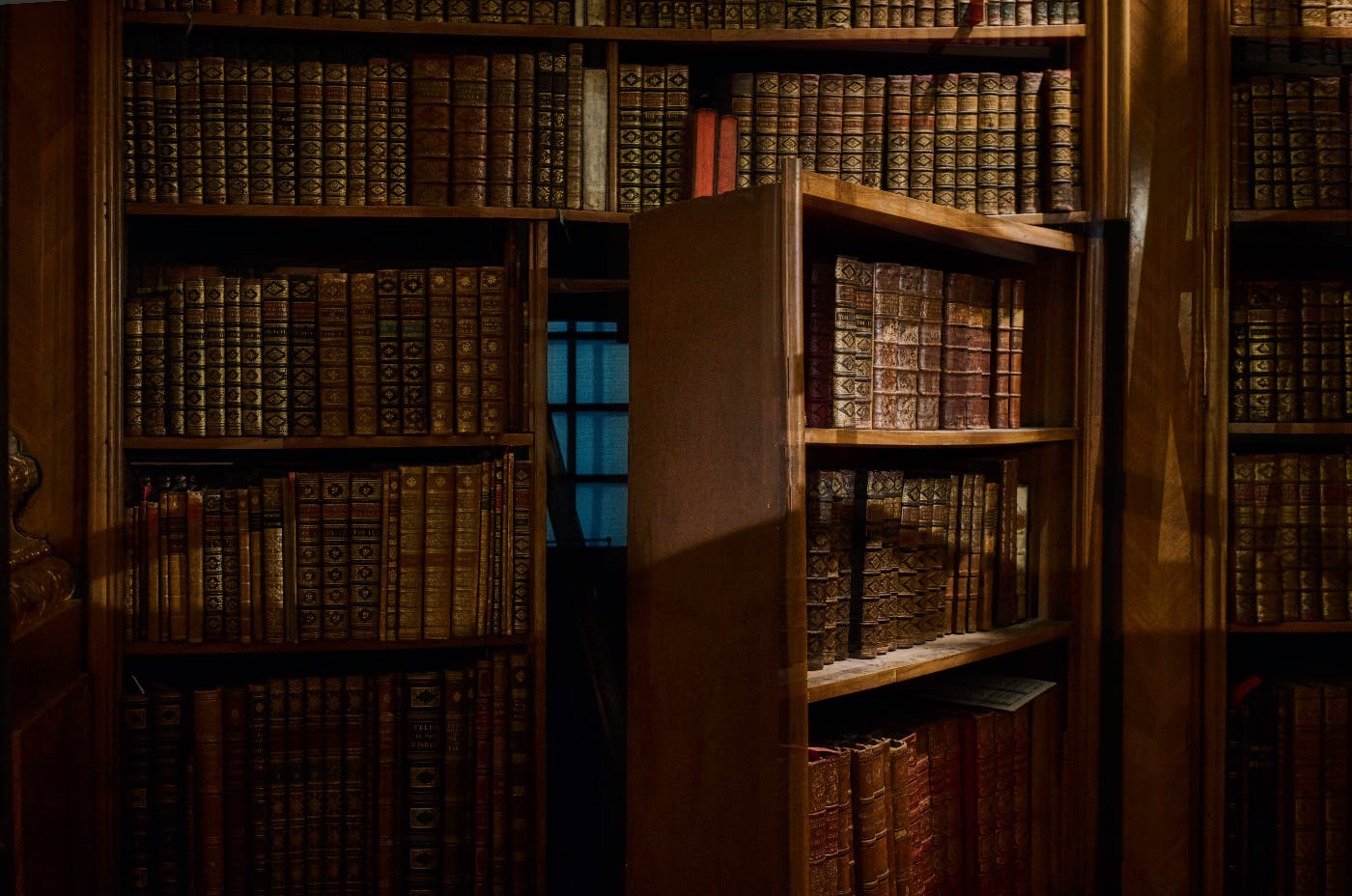 A bookcase with a secret door