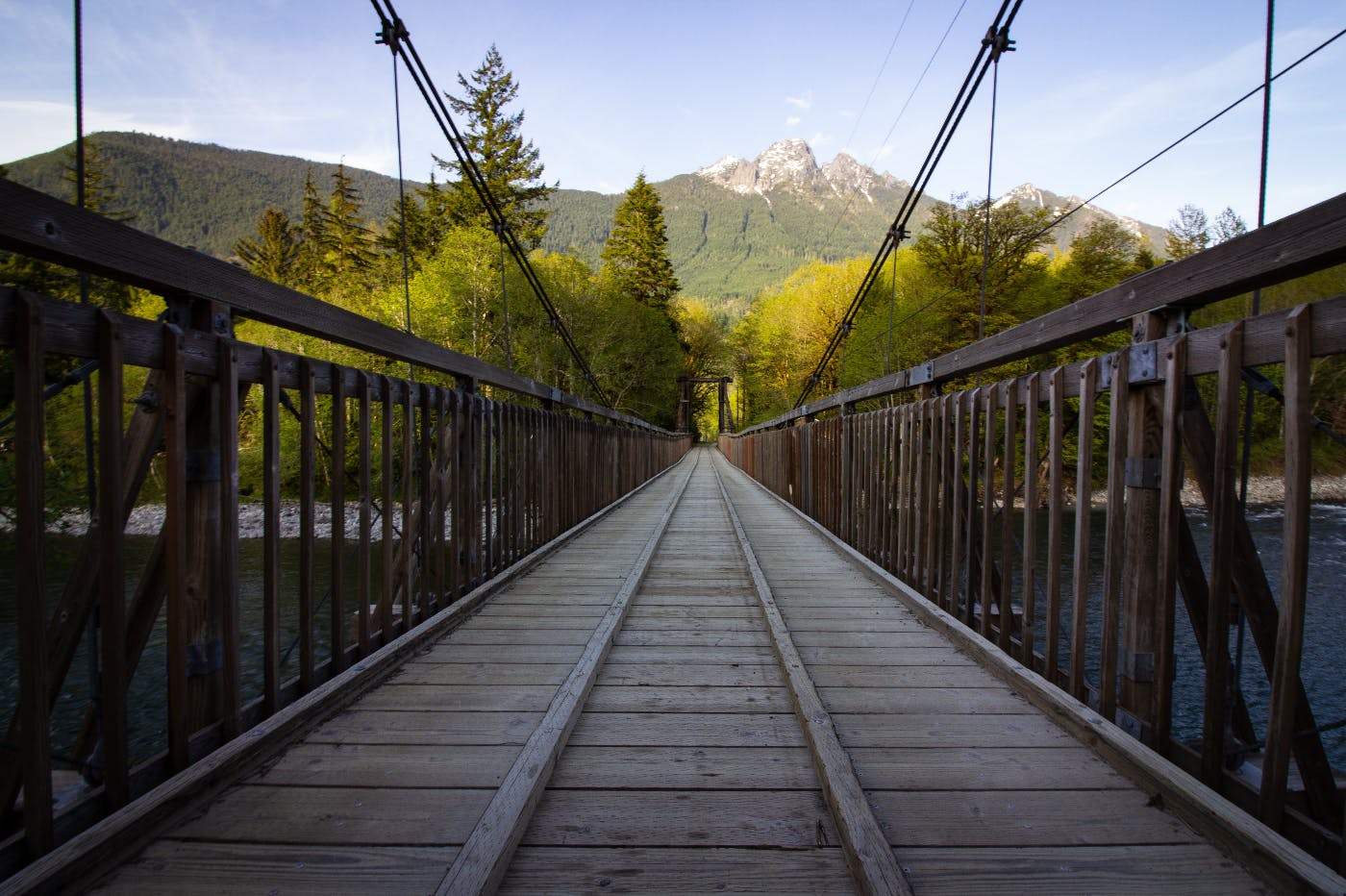 the view from one end of a bridge.