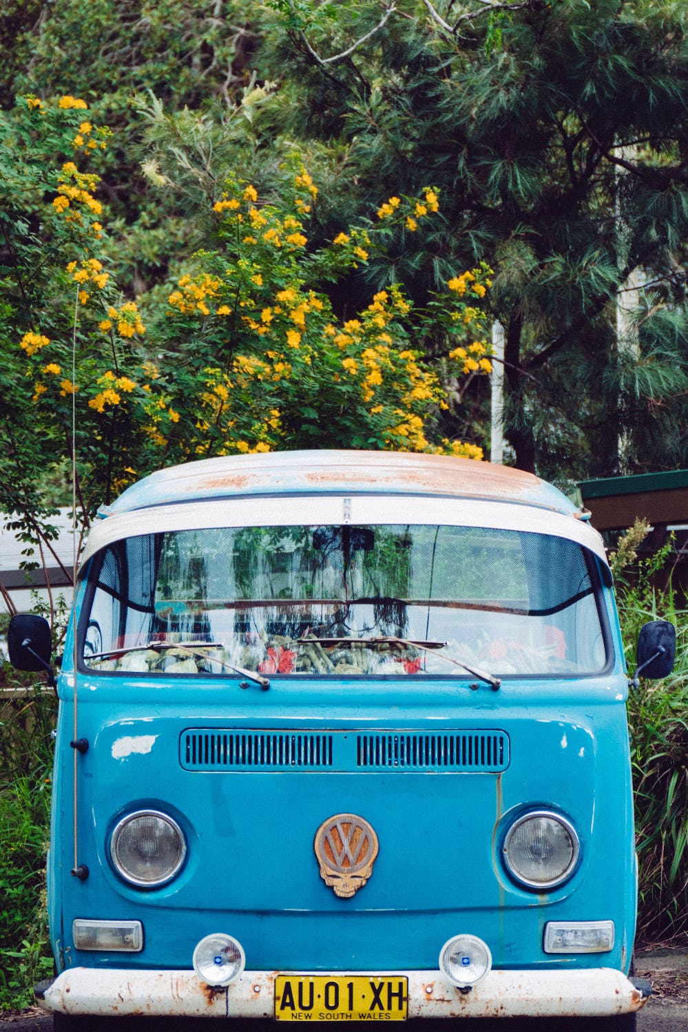 A classic blue VW microbus