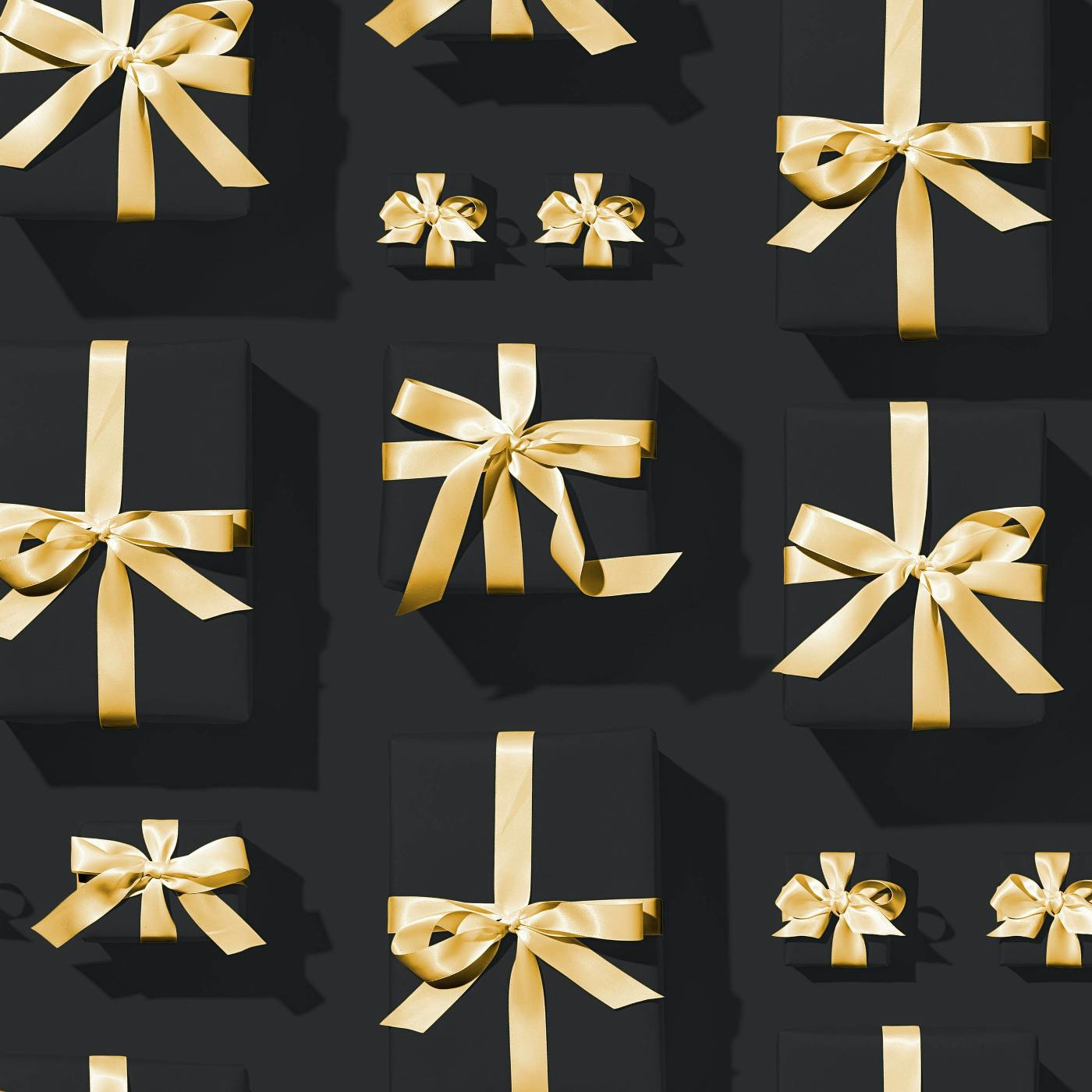 Black presents with gold ribbons